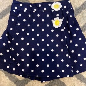 Toddler girls sunflower and polkadot skirt with front flap. Size 2T